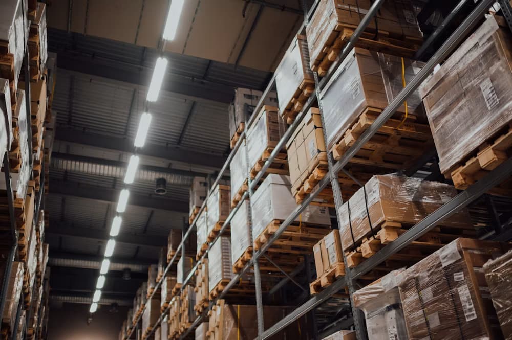 Warehouse shelves stacked with parcels